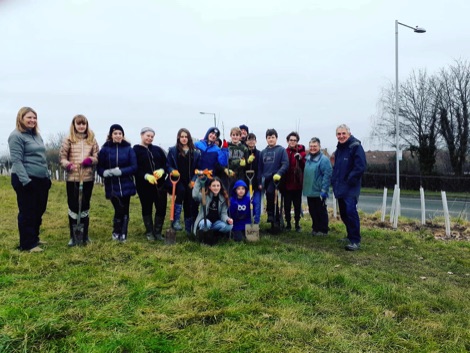 WEG volunteers with spades